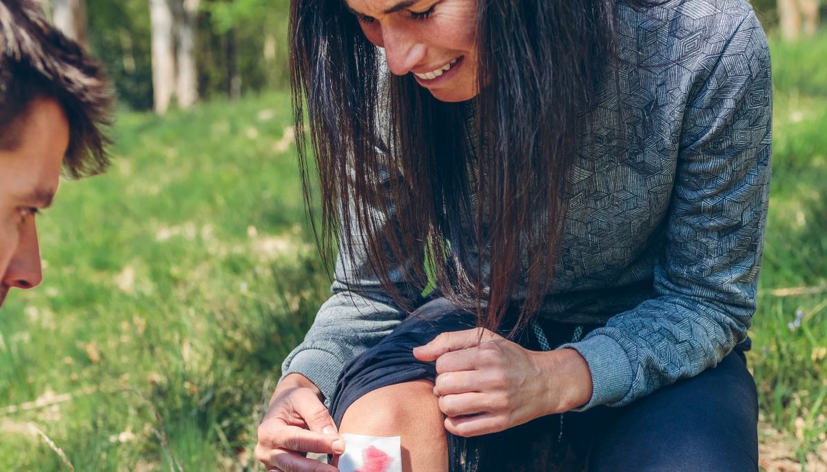 woman getting wound treated